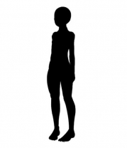 内股で立つ女性のシルエットイラストです